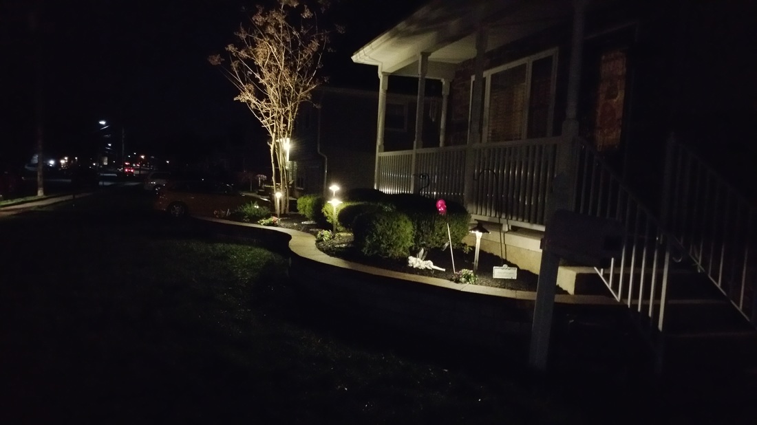 Stone wall with landscape lighting