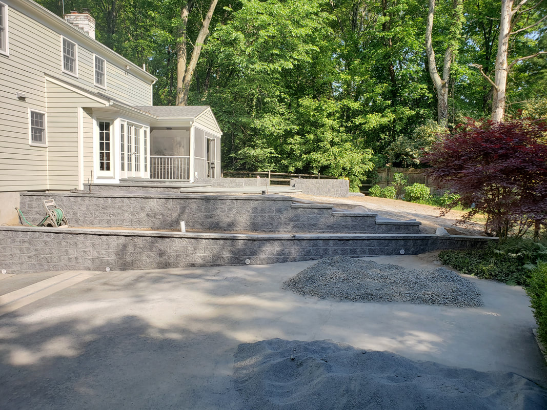 Retaining wall and patio construction